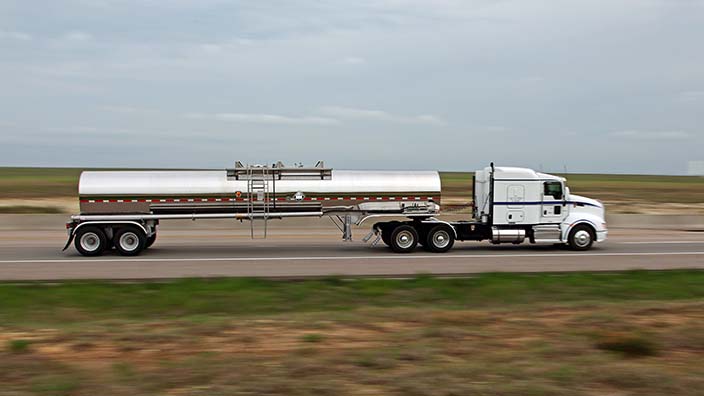 18 wheeler truck driving on road in Wichita